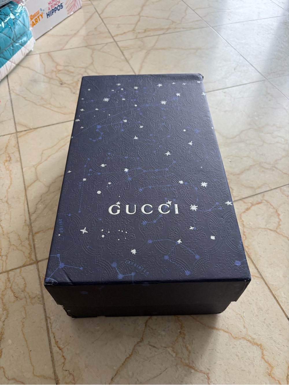 Gucci box likely shoe packaging